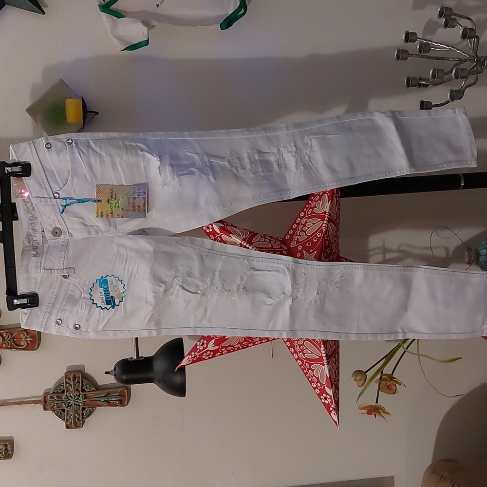 Y2K era jeans bleached almost white with rhinestones and destroyed details